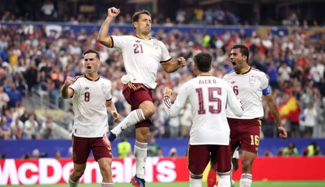 Spain beat France to reach final after Digne's costly error