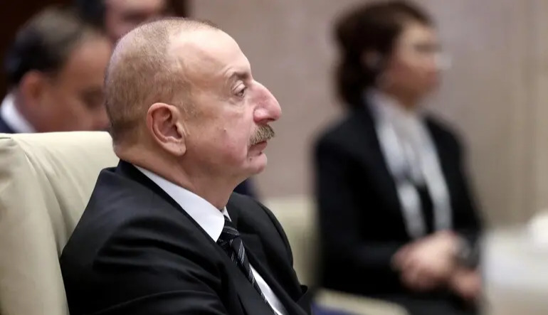 Azerbaijan's Aliyev says former German and Russian officials held Ukraine-related talks in Baku