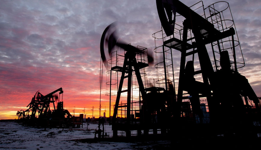 Oil prices have fallen to a one-month low amid talks between Russia and Ukraine, Reuters reports