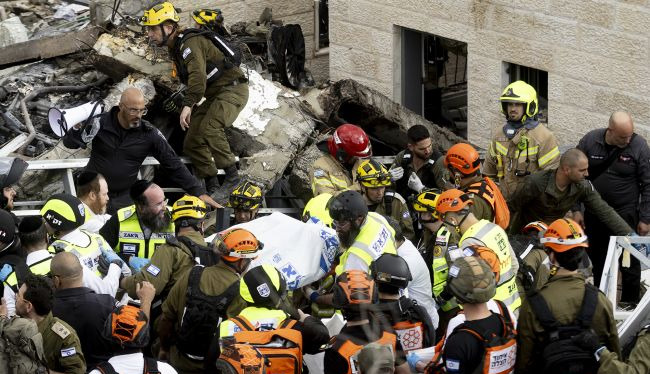 Iran ballistic missile hits Jerusalem-area shelter: nine dead, dozens injured