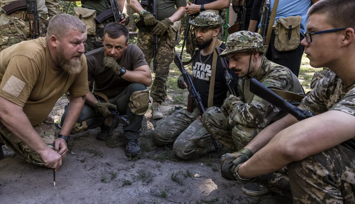 Students in Ukraine become reservists after finishing basic military training and taking the oath