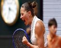 Marta Kostyuk reaches Wimbledon fourth round with first win over Emma Navarro